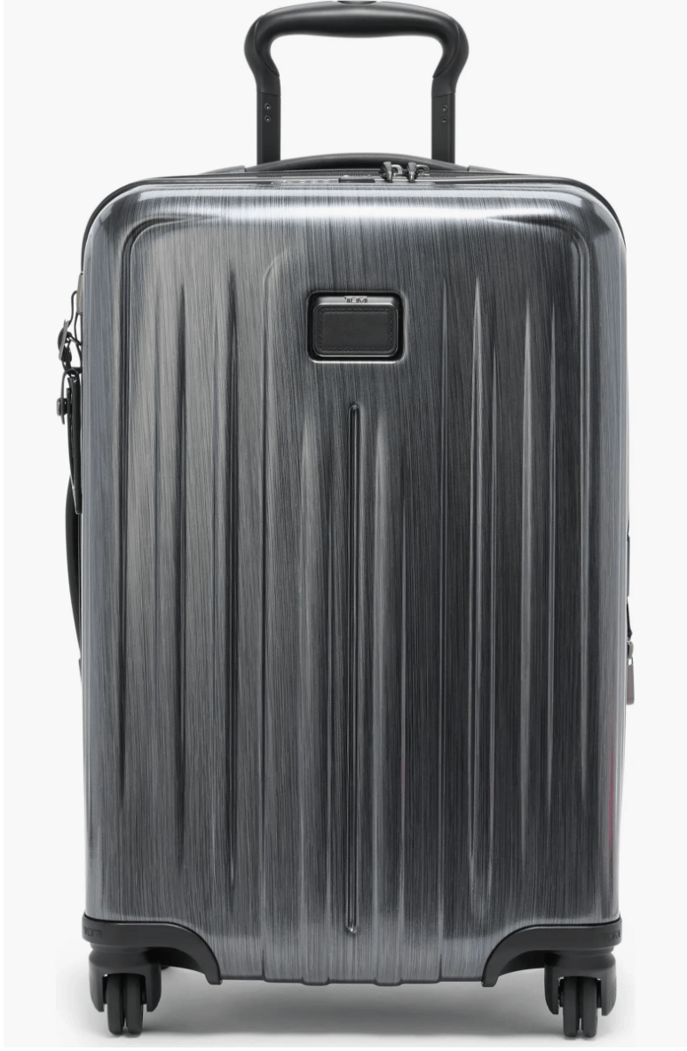 tumi carry on spinner suitcase